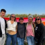 Participants posing together in Dutch tulip fields during Kronland’s Erasmus+ mobility project