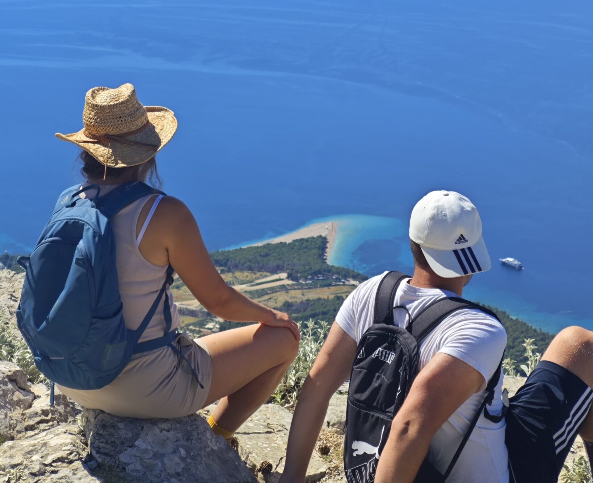 Participants of the 12 Peaks Challenge Up project on Vidova Gora, the highest peak of Brač Island, overlooking Zlatni Rat beach and the Adriatic Sea, Croatia.