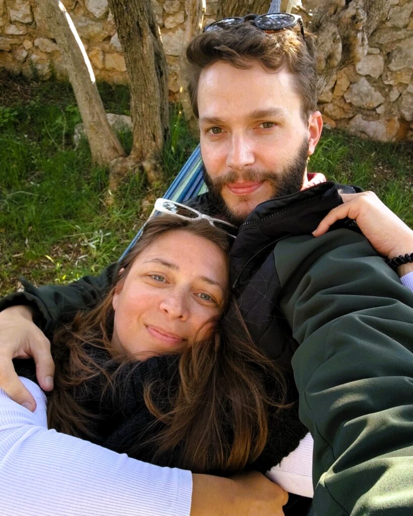 Two people celebrating new beginnings through gardening, nature, and shared dreams