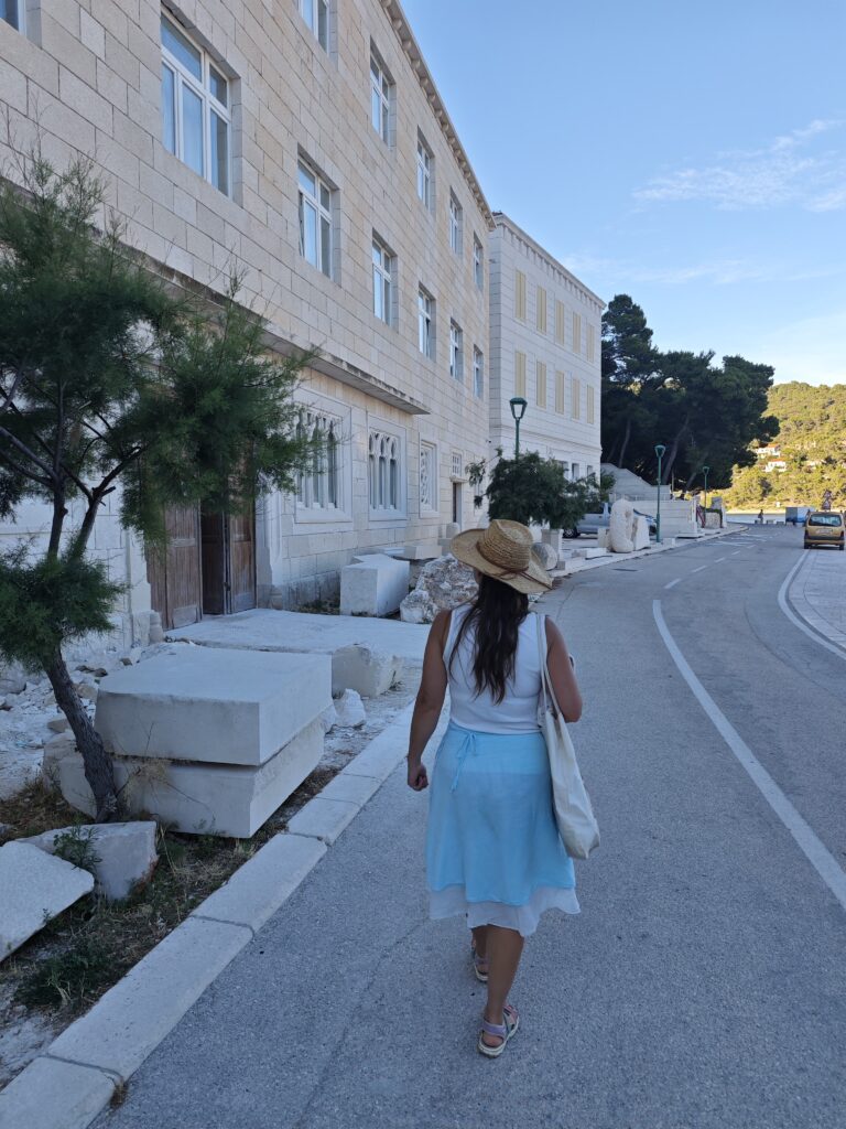 Walking past the Stonemasonry School in Pučišća, preserving the centuries-old tradition of Brač stone craftsmanship.